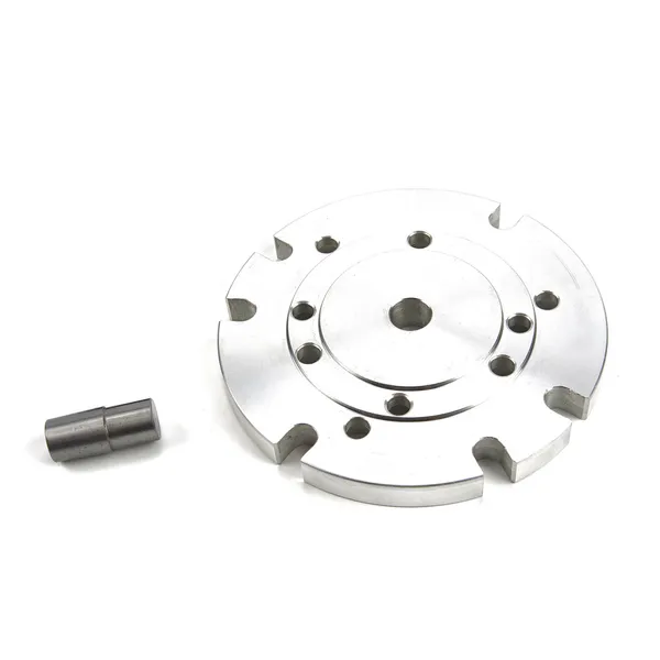 Adapterplate for montering av dreiechuck på rundmatingsbord
